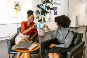 two women having coffee together